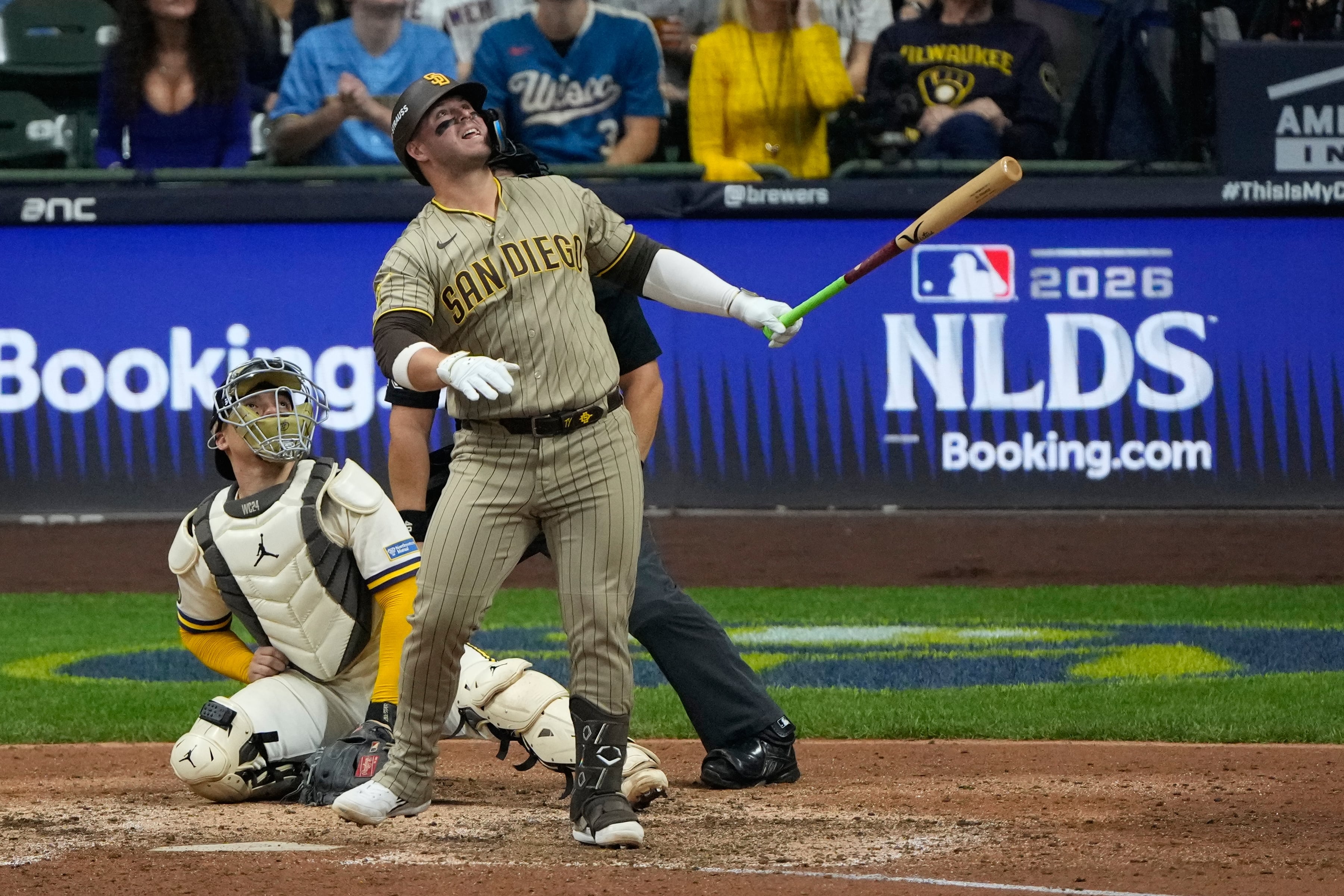 Brewers get a big assist from their ballpark roof to beat the Padres 3-2 in NLDS opener