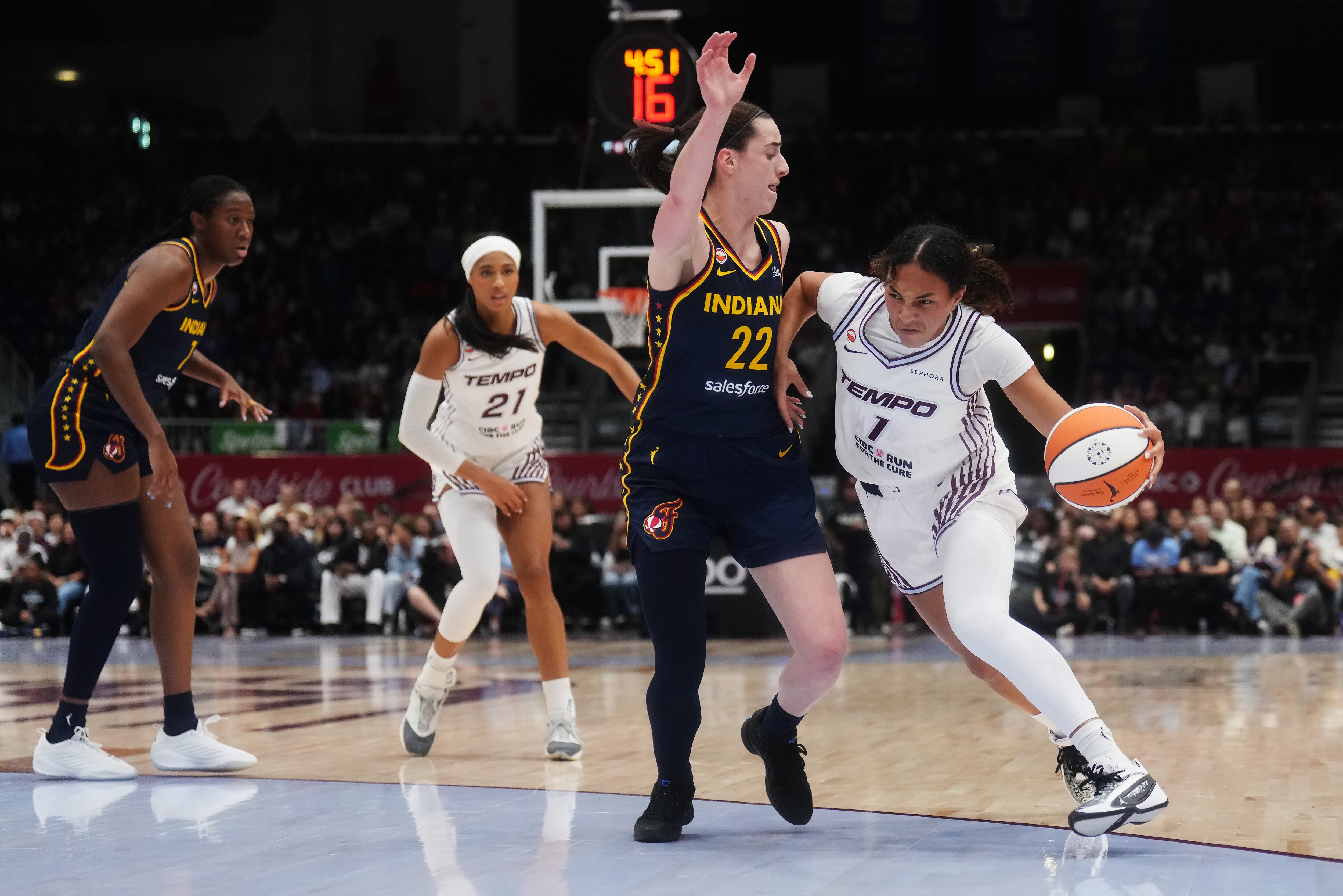 Fever's Mitchell surprised by postgame party after setting WNBA scoring record in win at Toronto