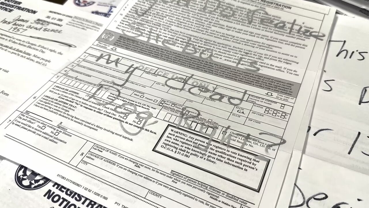 Voter registration forms sent to hundreds of dead Georgians and a dog